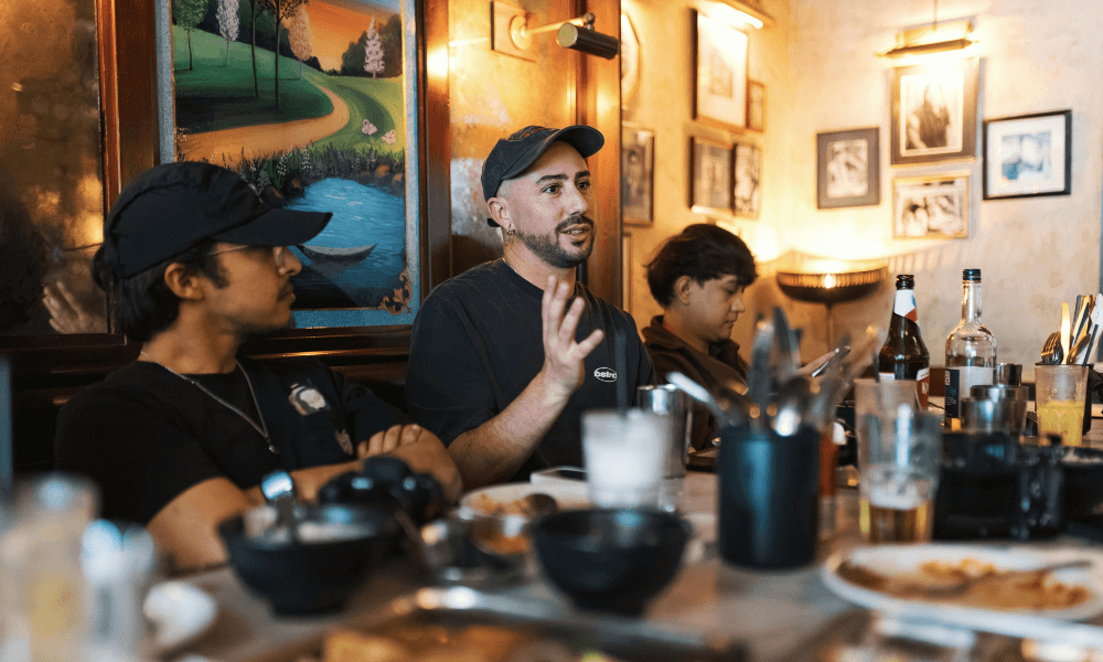 staff at restaurant talking at table