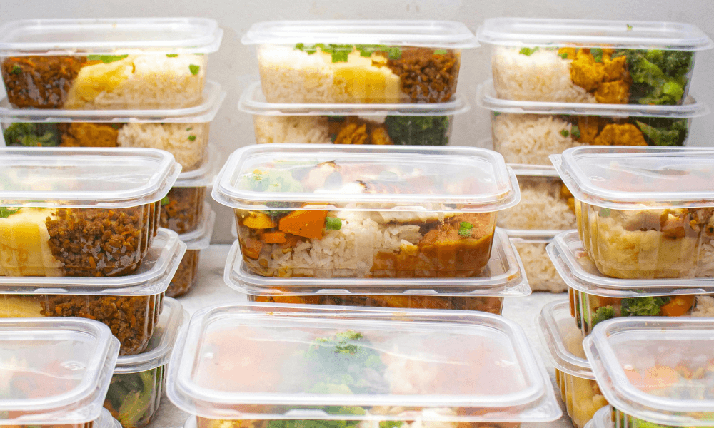 stacked clear plastic takeout containers